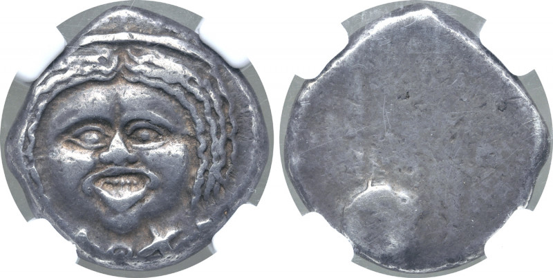 Etruria, Populonia AR 20 Asses. 3rd Century BC. Facing head of Metus, hair bound...