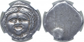 Etruria, Populonia AR 20 Asses. 3rd Century BC. Facing head of Metus, hair bound with diadem; X:X (mark of value) below / Uncertain round protuberance...