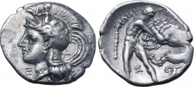 Calabria, Tarentum AR Diobol. Circa 380-325 BC. Head of Athena to left, wearing crested Attic helmet decorated with Skylla; Σ (retrograde) on neck gua...