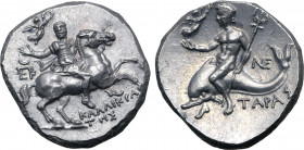 Calabria, Tarentum AR Nomos. Circa 240-228 BC. Kallikrates, magistrate. Reduced standard. Strategos, holding Nike who crowns him, in extended right ha...