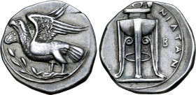 Bruttium, Kroton AR Stater. Circa 350-300 BC. Eagle standing to left on olive branch, with wings displayed and head raised / [KPOTΩ]NIATAN, tripod leb...