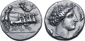 Sicily, Siculo-Punic AR Tetradrachm. Solus(?), circa 400-350 BC. Charioteer, holding kentron and reins, driving galloping quadriga to right; above, Ni...