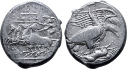 Sicily, Akragas AR Tetradrachm. Circa 410-406 BC. Reverse die signed by Silanos. Nike, holding kentron and reins, driving fast quadriga to left; table...