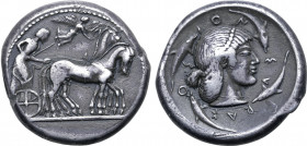 Sicily, Syracuse AR Tetradrachm. Deinomenid Tyranny. Time of Gelon I, circa 480-478 BC. Charioteer, holding kentron and reins, driving slow quadriga t...