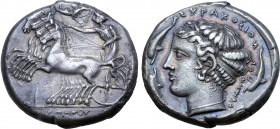 Sicily, Syracuse AR Tetradrachm. Time of the Second Democracy, circa 415-405 BC. Obverse and reverse dies signed by Eumenes. Charioteer driving fast q...