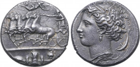 Sicily, Syracuse AR Dekadrachm. Time of Dionysios I, circa 405-370 BC. Reverse die signed by Euainetos. Charioteer driving galloping quadriga to left,...