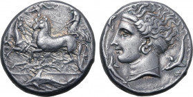 Sicily, Syracuse AR Tetradrachm. Time of Dionysios I, 405-400 BC. Unsigned dies in the style of Eukleidas. Charioteer, holding kentron in right hand a...
