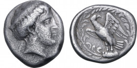 Elis, Olympia AR Stater. Hera mint, 111th Olympiad = 336 BC. Head of Hera to right, wearing pendant earring and stephane inscribed [FAΛEIΩN]; F behind...