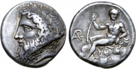 Arkadia, Arkadian League AR Stater. Circa 363-362 BC. Bearded, laureate head of Zeus Lykaios to left / Youthful Pan reclining upon a rocky outcrop, hi...
