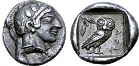 Attica, Athens AR Drachm. Circa 467-465 BC. Head of Athena right, wearing crested Attic helmet ornamented with three olive leaves above visor and spir...