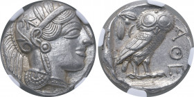 Attica, Athens AR Tetradrachm. Circa 454-404 BC. Head of Athena to right, wearing crested Attic helmet ornamented with three olive leaves above visor ...
