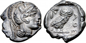 Attica, Athens AR Drachm. Circa 454-404 BC. Head of Athena to right, wearing earring, necklace, and crested Attic helmet decorated with three olive le...