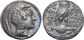 Attica, Athens AR New Style Tetradrachm. Circa 129/8 BC. Dioge-, Posei- and Dorothe-, magistrates. Head of Athena Parthenos to right, wearing necklace...