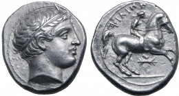 Kingdom of Macedon, Philip II AR 1/5 Tetradrachm. Pella, circa 342-336 BC. Head of Apollo to right, wearing tainia / Youth on horseback to right; ΦΙΛΙ...