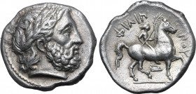 Kingdom of Macedon, Philip II AR Tetradrachm. Amphipolis, circa 342-328 BC. Laureate head of Zeus to right / Youth on horseback to right, holding rein...