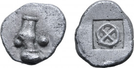Thraco-Macedonian Tribes, Ichnai AR Obol. Circa 485-470 BC. Horse’s hoof in profile to right, pellet in right field / Four spoked wheel within shallow...