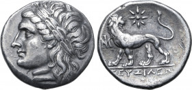 Ionia, Miletos AR Didrachm. Circa 294-281 BC. Zeuxileos, magistrate. Laureate head of Apollo to left / Lion standing to left, head reverted; star with...