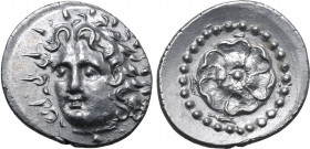 Rhodos, Rhodes AR Drachm. Circa 88/42 BC-AD 14. Unsigned. Radiate head of Helios facing slightly to left / Rose seen from above; P-O across fields, co...