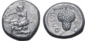 Cilicia, Soloi AR Stater. Circa 440-410 BC. Amazon kneeling to left, nude to the waist, wearing bonnet and with bowcase at hip, stringing bow / Grape ...