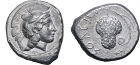 Cilicia, Soloi AR Stater. Circa 410-375 BC. Head of Athena to right, wearing crested Attic helmet decorated with griffin / Grape bunch on vine with te...