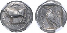 Cyprus, Paphos AR Stater. Onasioikos, circa 450-440 BC. Bull standing to left on beaded double line; winged solar disk above, ankh to left; all within...