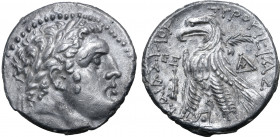 Phoenicia, Tyre AR Shekel. Dated CY 65 = 62/1 BC. Laureate bust of Melkart to right / ΤΥPΟΥ ΙΕΡΑΣ ΚΑΙ ΑΣΥΛΟΥ, eagle standing to left on prow, palm beh...