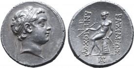 Seleukid Empire, Antiochos (son of Seleukos IV) AR Tetradrachm. Antioch, circa 175 BC. Diademed head to right / Apollo Delphios seated to left on omph...