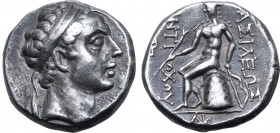 Seleukid Empire, Antiochos IV Epiphanes AR Drachm. Uncertain eastern mint, 175-164 BC. Diademed head to right / Apollo Delphios seated to left on omph...
