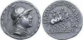 Greco-Baktrian Kingdom, Eukratides I Megas AR Tetradrachm. Circa 170-145 BC. Diademed and draped bust to right, wearing crested helmet adorned with bu...