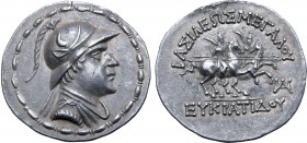 Greco-Baktrian Kingdom, Eukratides I Megas AR Tetradrachm. Circa 170-145 BC. Diademed and draped bust to right, wearing crested helmet adorned with bu...