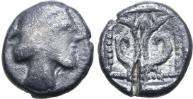 Philistia (Palestine), uncertain mint AR Drachm. Circa 450-333 BC. Head to right / Paradise flower/Phoenician palmette; all in dotted square within in...