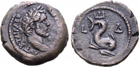 Antoninus Pius Æ Obol of Alexandria, Egypt. Dated RY 4 = AD 140/1. ΑVΤ Κ Τ ΑΙΛ ΑΔΡ ΑΝΤѠΝΙΝΟϹ, laureate head to right / Dolphin coiled about trident; L...