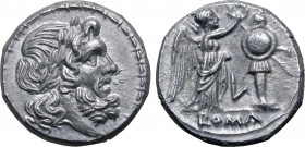 L series AR Victoriatus. Luceria, 211-208 BC. Laureate bust of Jupiter to right, within bead and reel border / Victory standing to right, crowning tro...