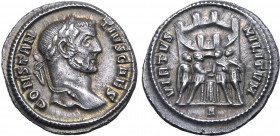 Constantius I, as Caesar, AR Argenteus. Rome, AD 295-297. CONSTANTIVS CAES, laureate head to right / VIRTVS MILITVM, four tetrarchs sacrificing over t...