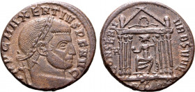 Maxentius BI Nummus. Rome, AD 310-311. IMP C MAXENTIVS P F AVG, laureate head to right / CONSERV VRB SVAE, Roma seated facing, head to left, holding g...
