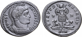 Constantine I 'the Great' BI Nummus. Treveri, AD 320-321. CONSTANTINVS AVG, helmeted and cuirassed bust to right / VIRTVS EXERCIT, trophy with captive...