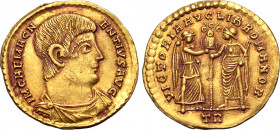 Magnentius AV Solidus. Treveri, AD 350. IM CAE MAGNENTIVS AVG, bare-headed, draped and cuirassed bust to right / VICTORIA AVG LIB ROMANOR, Victory sta...