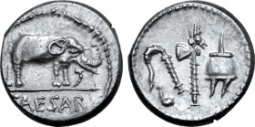 Julius Caesar AR Denarius. Military mint moving with Caesar, 49-48 BC. Elephant advancing to right, trampling on serpent; CAESAR in exergue / Emblems ...