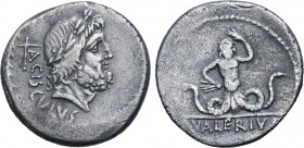 L. Valerius Acisculus AR Denarius. Rome, 45 BC. Laureate head of Jupiter to right; acisculus and ACISCVLVS behind, all within laurel wreath / Anguiped...