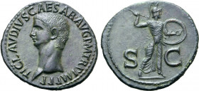 Claudius Æ As. Rome, AD 50-54. TI CLAVDIVS CAESAR AVG P M TR P IMP P P, bare head to left / Minerva, helmeted and draped, hurling javelin to right, wi...