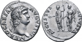 Nero AR Denarius. Rome, AD 64-65. NERO CAESAR AVGVSTVS, laureate head to right / AVGVSTVS AVGVSTA, radiate Emperor standing to left, holding patera an...