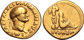 Vespasian AV Aureus. Rome, AD 69-70. IMP CAESAR VESPASIANVS AVG, laureate head to right / Judaea seated to right, head resting on hand, to right of tr...