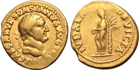 Vespasian AV Aureus. Lugdunum, AD 71. IMP CAESAR VESPASIANVS AVG TR P, laureate head to right / IVDAEA DEVICTA, Judaea, with hands tied together, stan...