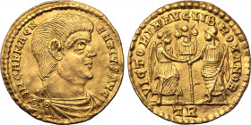 Magnentius AV Solidus. Treveri, AD 350-353. IM CAE MAGNENTIVS AVG, bare-headed, draped and cuirassed bust to right / VICTORIA•AVG•LIB•ROMANOR, Victory...