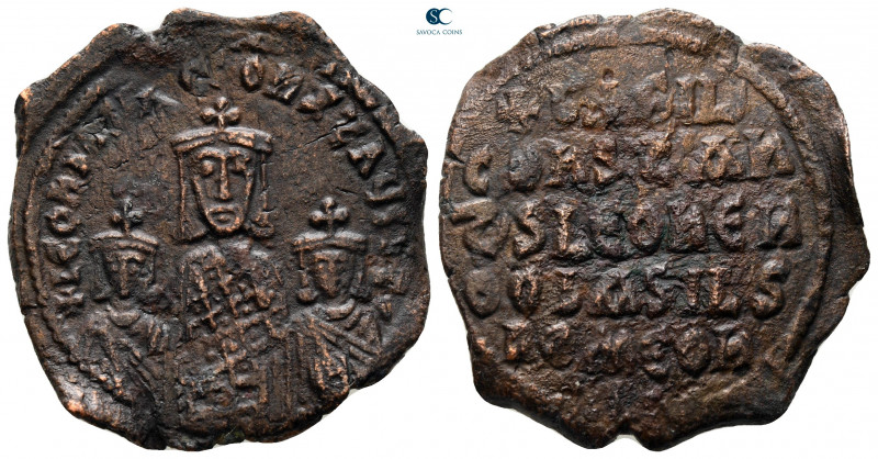 Basil I, with Leo VI and Constantine VII AD 867-886. Constantinople
Follis Æ
...