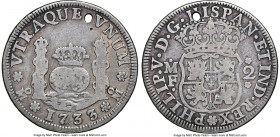 Philip V "Milled" 2 Reales 1733 Mo-MF NGC, Mexico City mint, KM84, Cal-805. Displaying slate surfaces with honest wear and a small hole that assigns t...