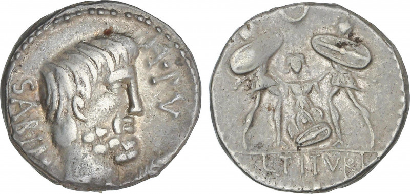 Denario. 89 a.C. TITURIA. L. Titurius L.f. Sabinus. Anv.: Cabeza del rey Tatius ...