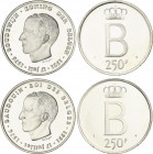 Lote 2 monedas 250 Francs. (1976). AR. Leyenda en francés y holandés. En presentaciones originales. KM- 157.2, 158.2. FDC.