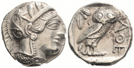 Greek
ATTICA. Athens. (Circa 449-404 BC).
AR Tetradrachm (24.7mm 17.16g)
Head of Athena to right, wearing crested Attic helmet adorned with three oliv...