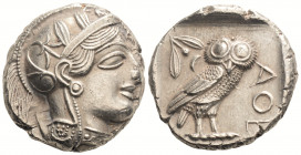 Greek
ATTICA, Athens. (Circa 449-404 BC).
AR Tetradrachm (25mm 17.18g)
Head of Athena to right, wearing crested Attic helmet adorned with three olive ...